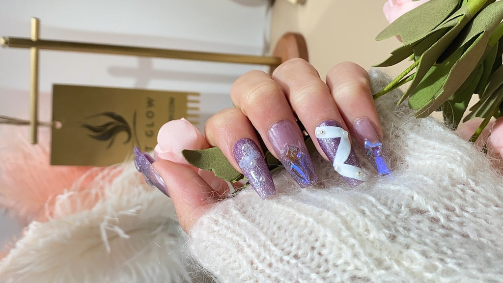 Chic purple handcrafted press-on nails with hand-painted details and pearls by LT Glow. Elevating the elegance of artificial nails.