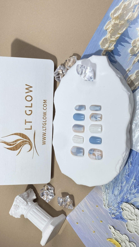 LTGlow's crafted fake nails in a distinctive squoval design, elegantly painted in blue and white