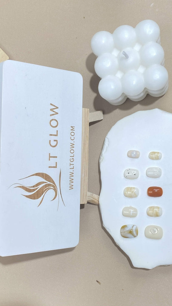 Handcrafted squoval fake nails from LT-Glow featuring a blend of earthy brown and pristine white, adorned with brilliant crystals