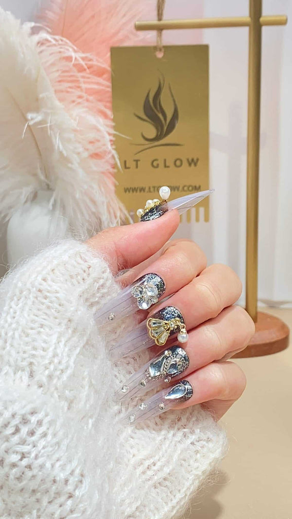 Exquisite gradient black nails from LT-Glow adorned with luminous pearls, sparkling diamonds, and shimmering crystal charms. These are handcrafted to perfection, offering a blend of elegance and luxury