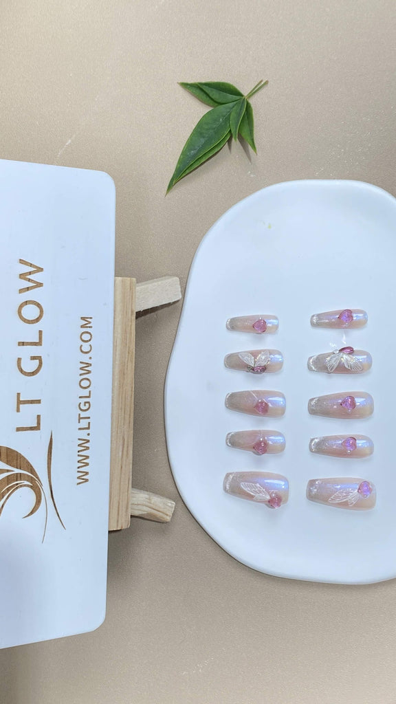 Delve into the elegance of our hand-painted nude press-on nails, accentuated with diamond and crystal enhancements for the ultimate acrylics nails design