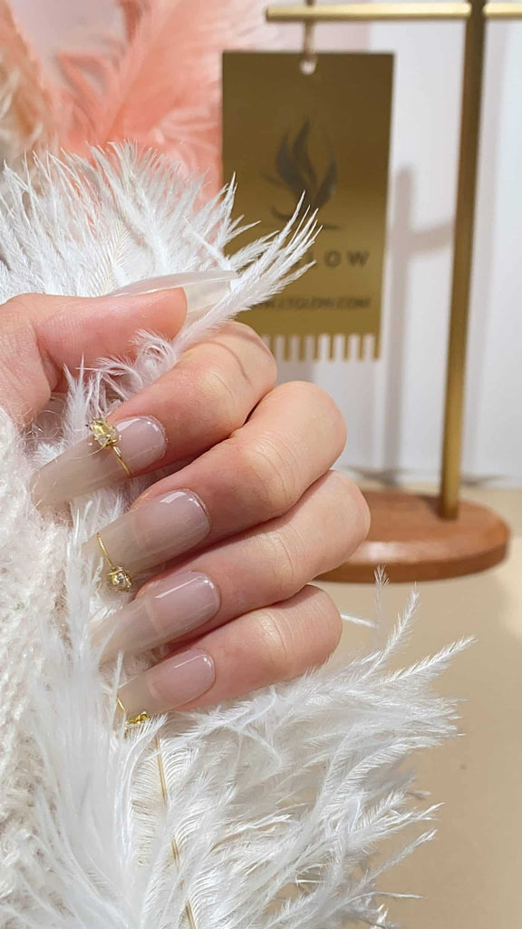 LT Glow's Dazzling White Long Coffin Nails, adorned with Diamonds and Crystals, epitomizing exquisite handcrafting