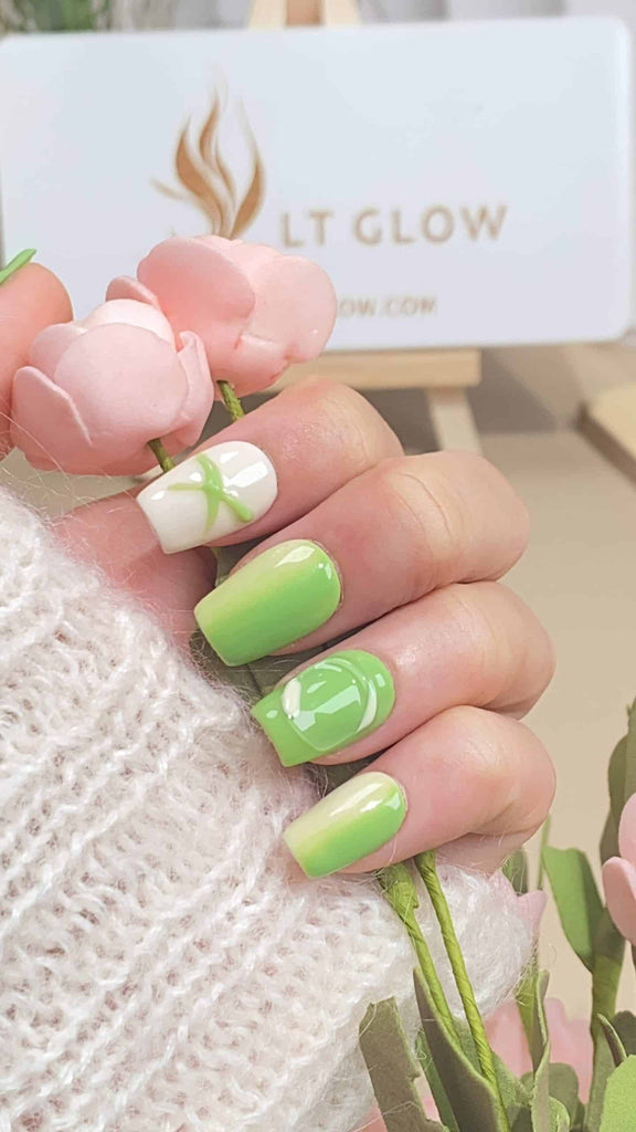 Handcrafted square press-on nails by LT-Glow, blending pristine white with vibrant green, enhanced with unique 3D artistry for added depth and texture