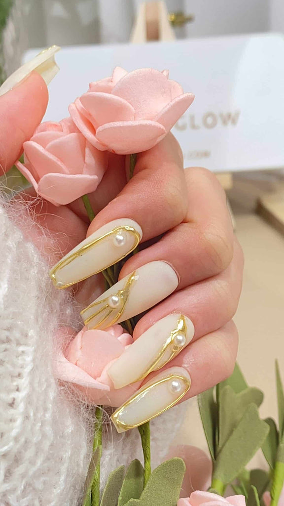 Handcrafted coffin press-on nails by LTGlow, featuring a harmonious blend of white and yellow tones, embellished with lustrous pearl accents for an elevated touch