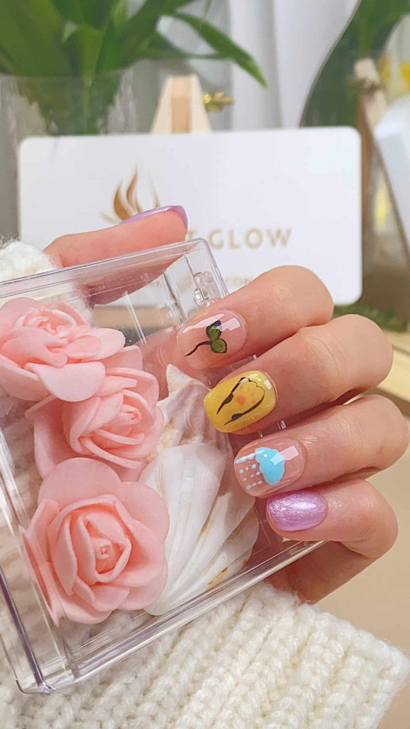 Handmade squoval press-on nails by LTGlow, featuring a dreamy blend of yellow and purple, adorned with charming sheep motifs and fluffy cloud designs