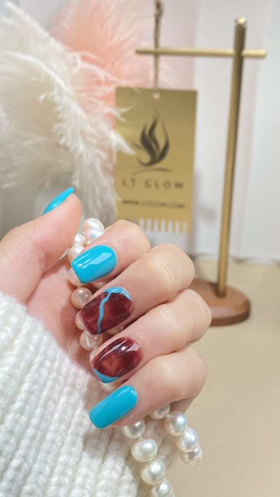 Handmade squoval press-on nails by LTGlow, featuring a captivating blend of blue and red, symbolizing the harmony of cool and warm tones