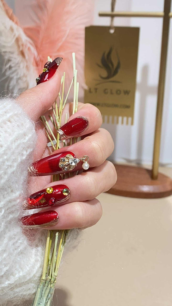 LT Glow: Charm and Flower Embellishments on Red Coffin-Shaped Handmade Press-On Nails