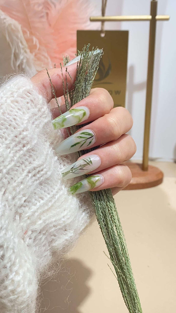 LT Glow's Distinctive Hand-painted Green Coffin Nails, Reflecting Mastery in Nail Art