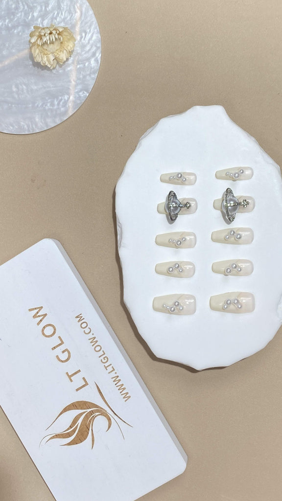 White Coffin Nails adorned with Sparkling Diamonds and Lustrous Pearls by LT Glow