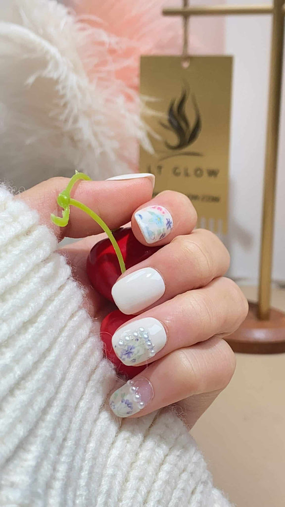 Elegant white squoval press-on nails by LT-Glow, hand-painted with delicate pearl accents