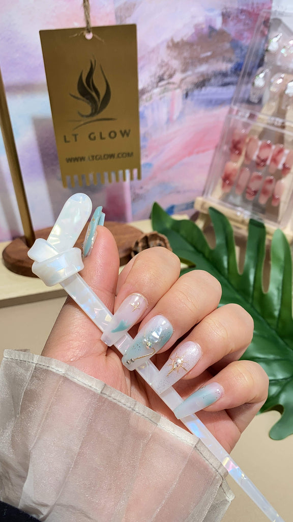 Handmade false nails from LT Glow, celebrating the innovative spirit of Aquarius through a meticulously crafted zodiac-themed design.