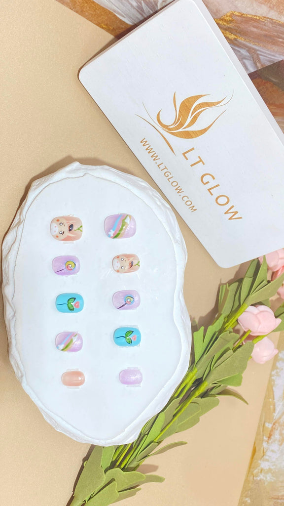 Elegant fake nails by LT Glow, featuring a meticulously handcrafted squoval design in a delightful purple, blue, and nude palette, enriched with charming hand-painted horse and flower motifs.
