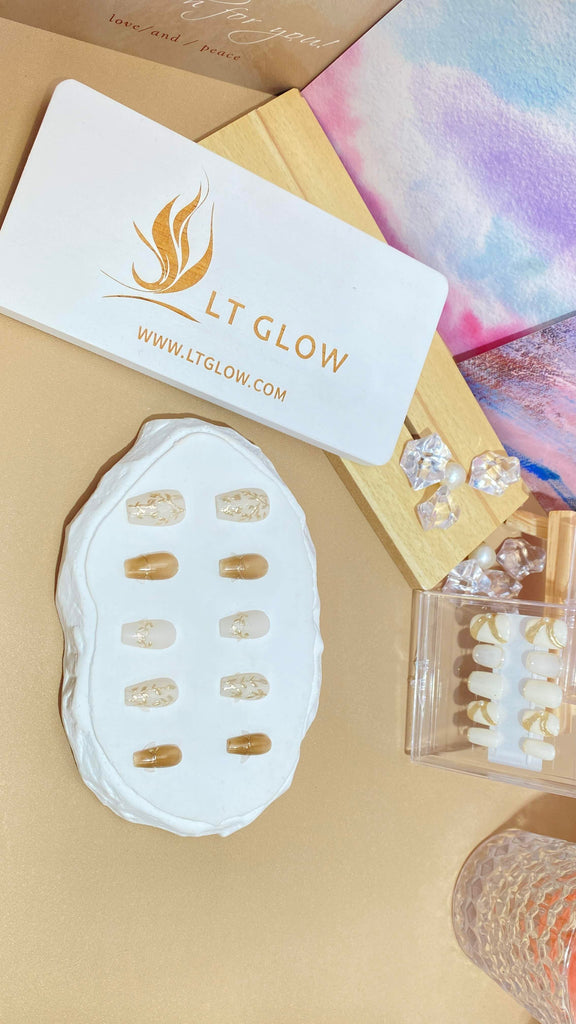 LT Glow's charming 3D and charms adorn these handmade coffin-shaped press-on nails, blending white, brown, and rose leaf motifs for a nature-inspired look.