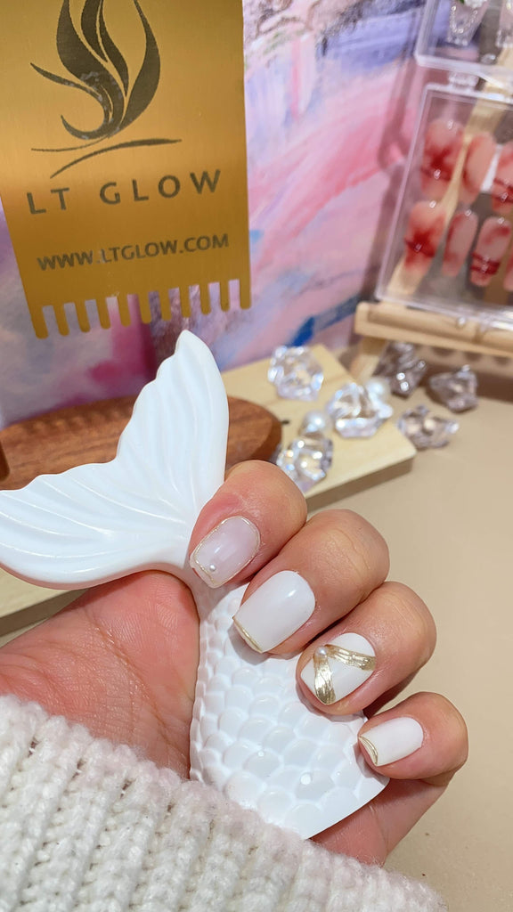 Elegant fake nails by LT Glow, featuring a meticulously handcrafted square design in pristine white, complemented by exquisite hand-painted pearls.