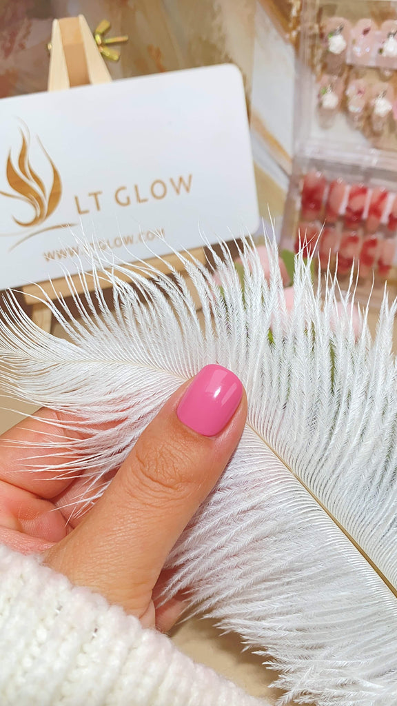 LT Glow's artistic square press-on nails in pink and white, showcasing a beautiful combination of intricate 3D and charming hand-painted details, handcrafted with care.