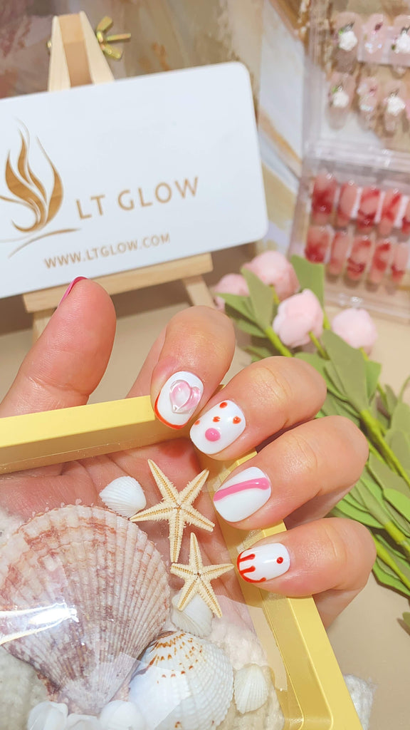 LT Glow's square-shaped press-on nails in a charming blend of pink and white, featuring intricate 3D and charming hand-painted details for a stylish and artistic look.